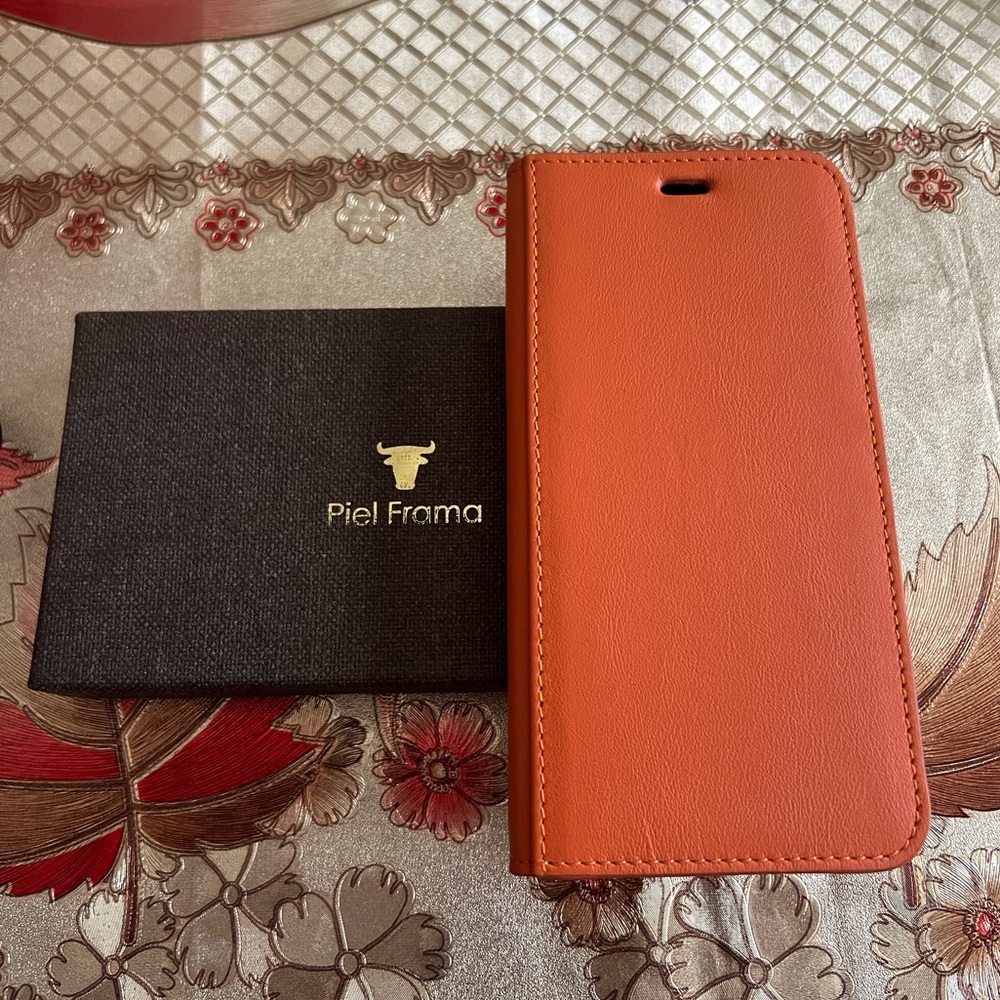 Brand new Piel Frama 11 Pro max orange phone case